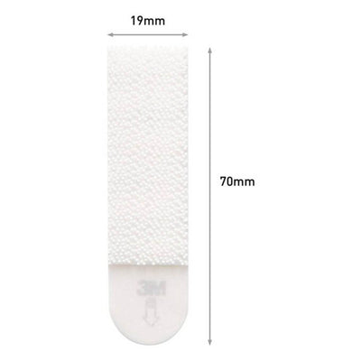 The Command hanging strips in medium measure 19 millimeters across, and 70 mm lenghtwise